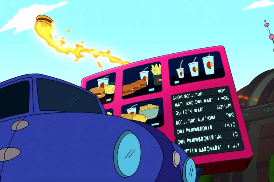 a flaming burger flies above a drive-thru menu and car