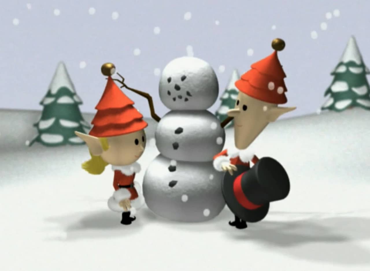 two elves with a snowman
