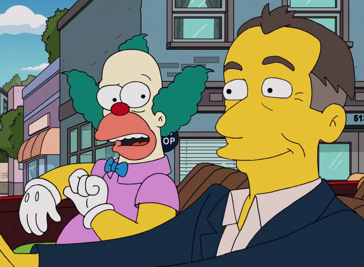 Jerry Seinfeld driving in a convertible with Krusty the Clown
