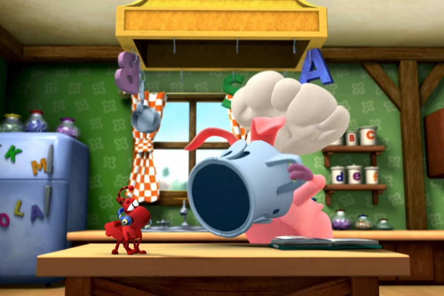 Pig sticking his face in the pot as Ant sits on the countertop