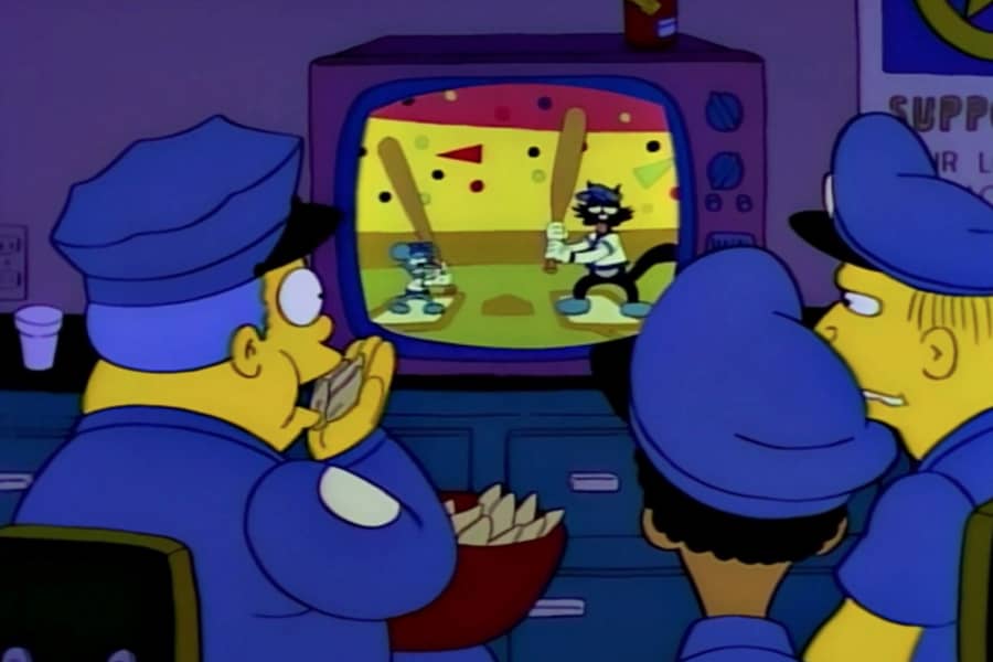 officers eating chips and watching Itchy and Scratchy on tv