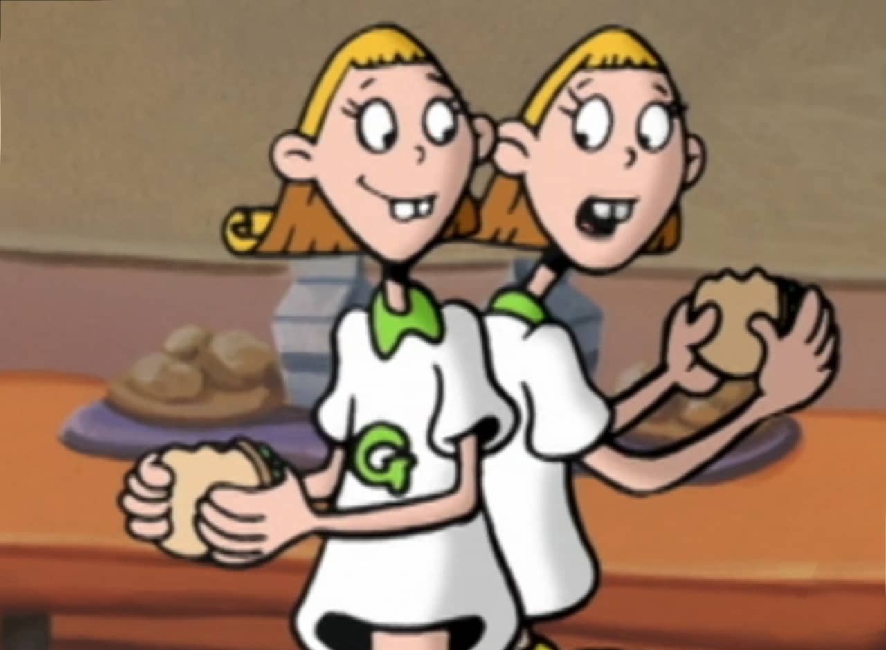 Gina and Tina, two blonde teen twins, eating sandwiches