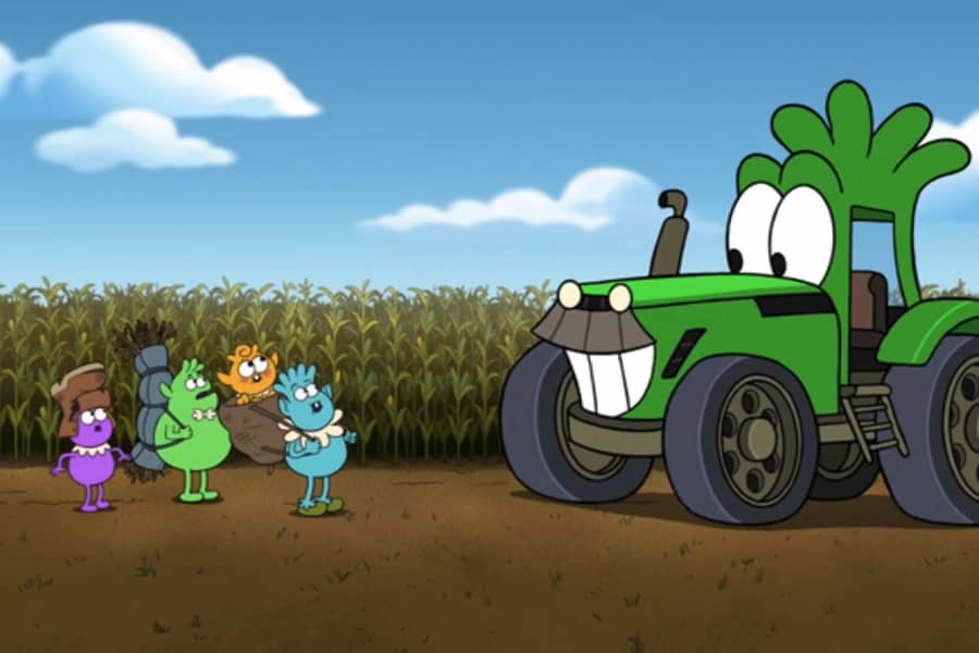 The Croblins approach a green tractor with a face