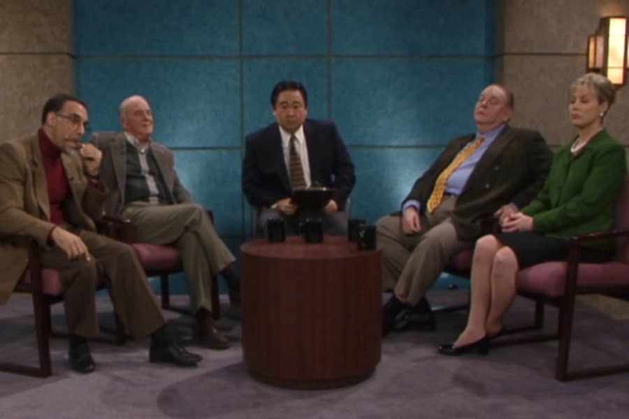 Ted Shaw flanked by four guests