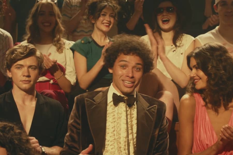 Tony Cruz sitting in the crowd of teens