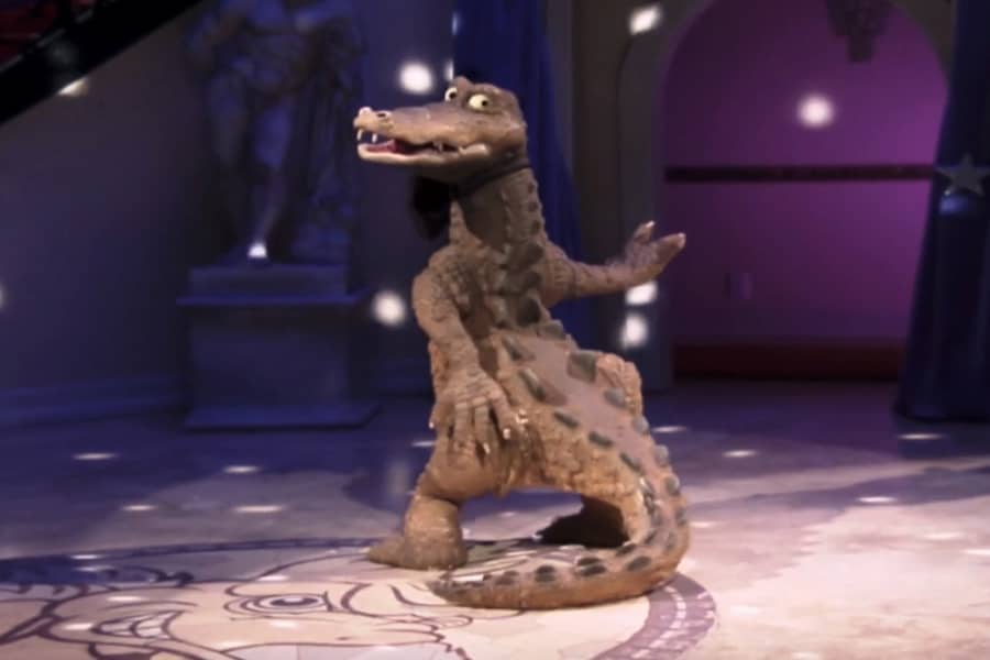 Rico dancing, turning his head around toward the camera