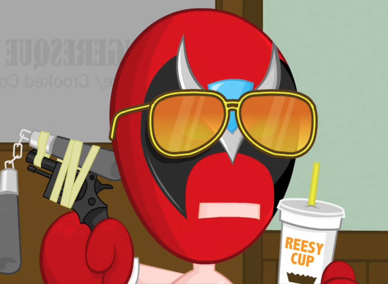 Strong Bad with aviator sunglases, a gun with nunchucks taped to it, and a Reesy Cup shake