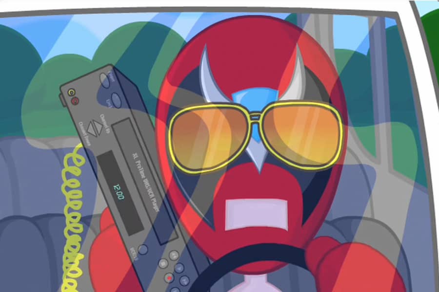 Strong Bad in a car talking on a VCR phone