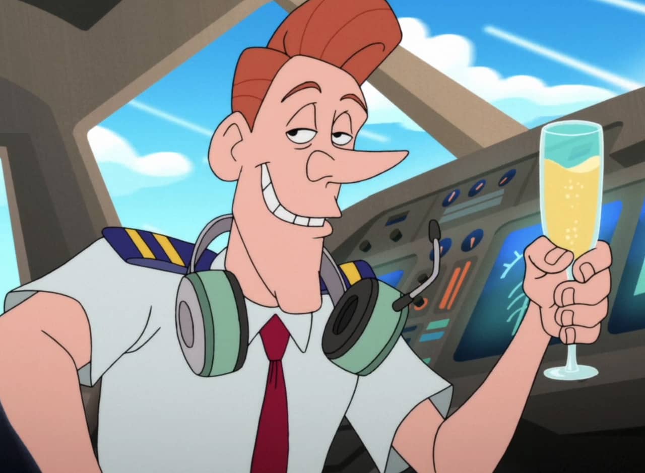 pilot holding a glass of champagne