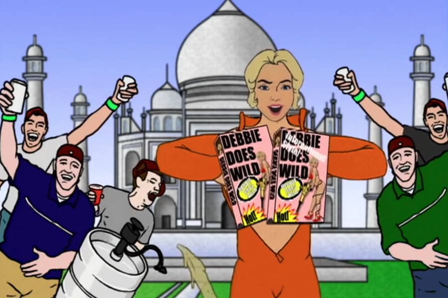 Debbie showing her VHS-covered breasts in front of the Taj Mahal