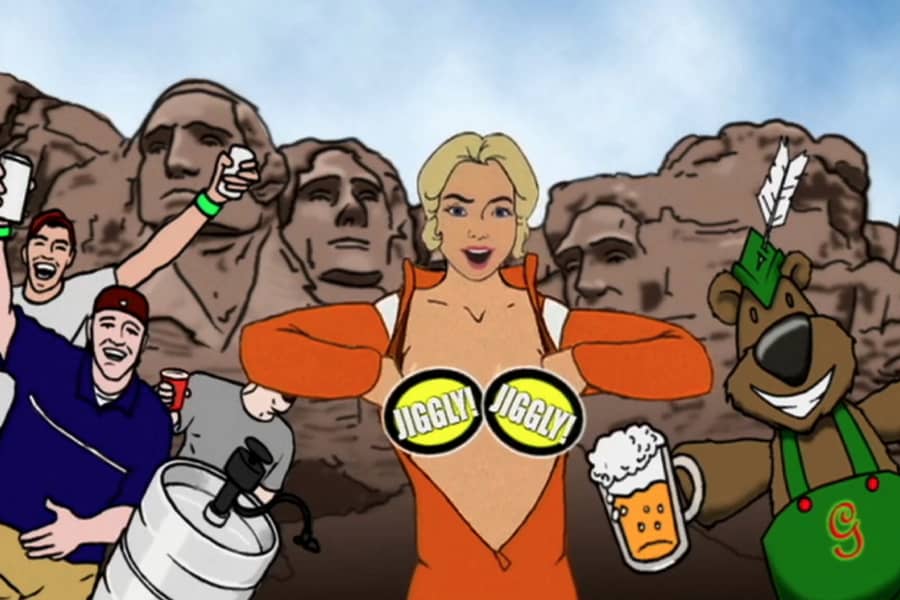Debbie showing her logo-covered breasts in front of Mount Rushmore