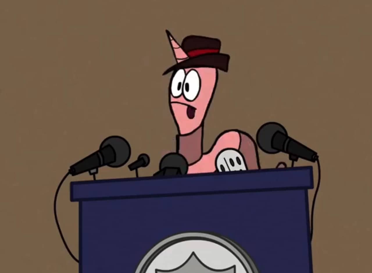Detective Unisquirm, a worm with a unicorn horn, at a press podium
