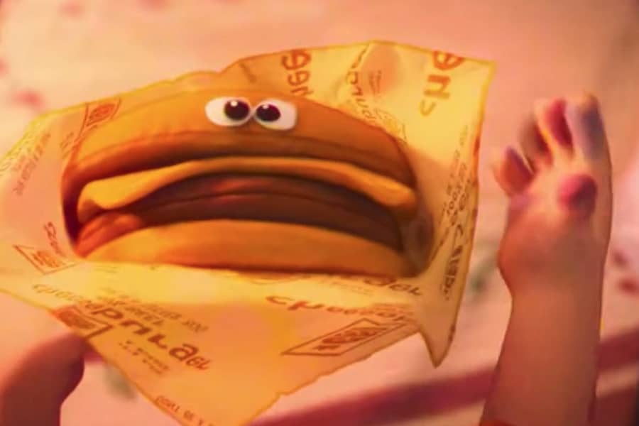 the burger in the wrapper has googly eyes