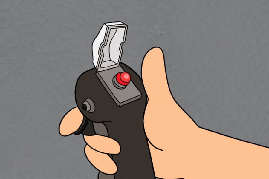 a hand about to push a red trigger button