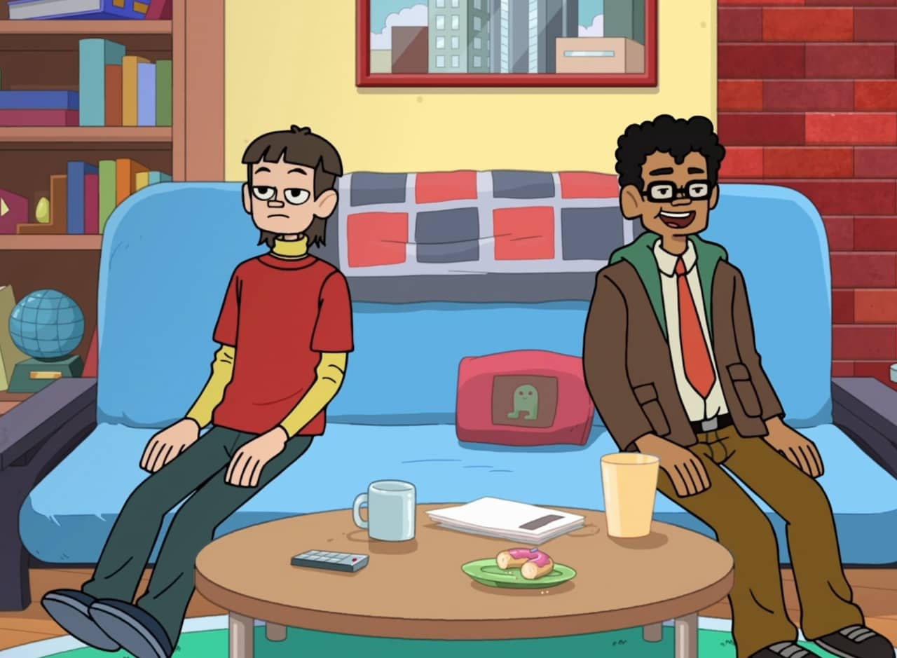 Dirk and his roommate sitting on the couch