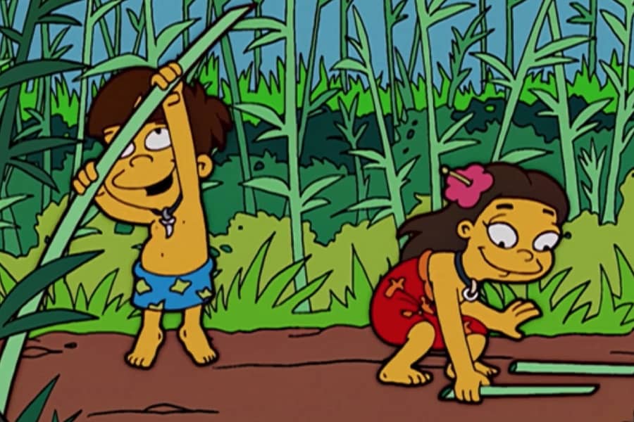 two indigenous looking kids picking sugar cane