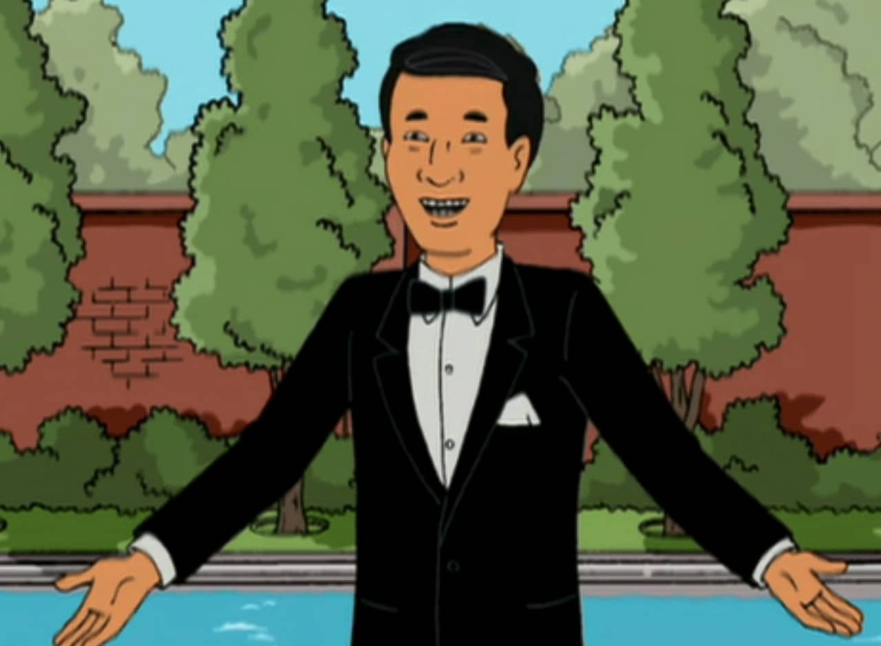 Dr. Money, an Asian man in a tuxedo
