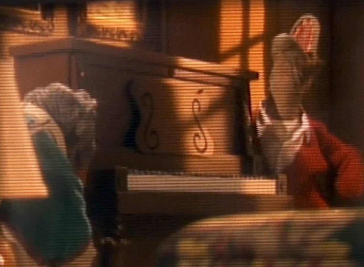 dinosaur screaming as he tries to move a piano