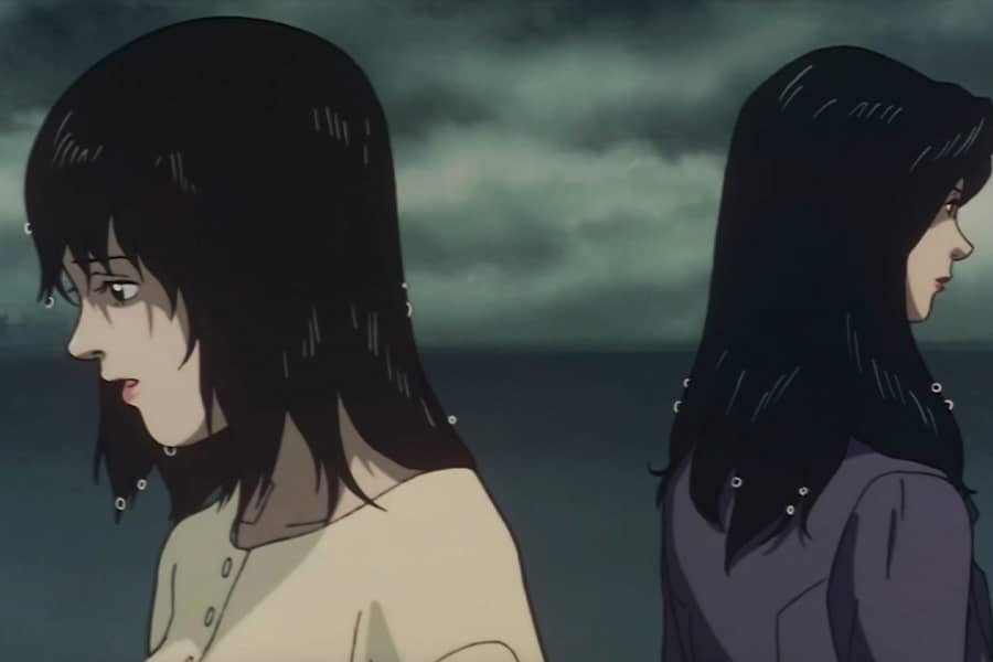 Yoko facing away from Dr. Asamiya, both standing in the rain