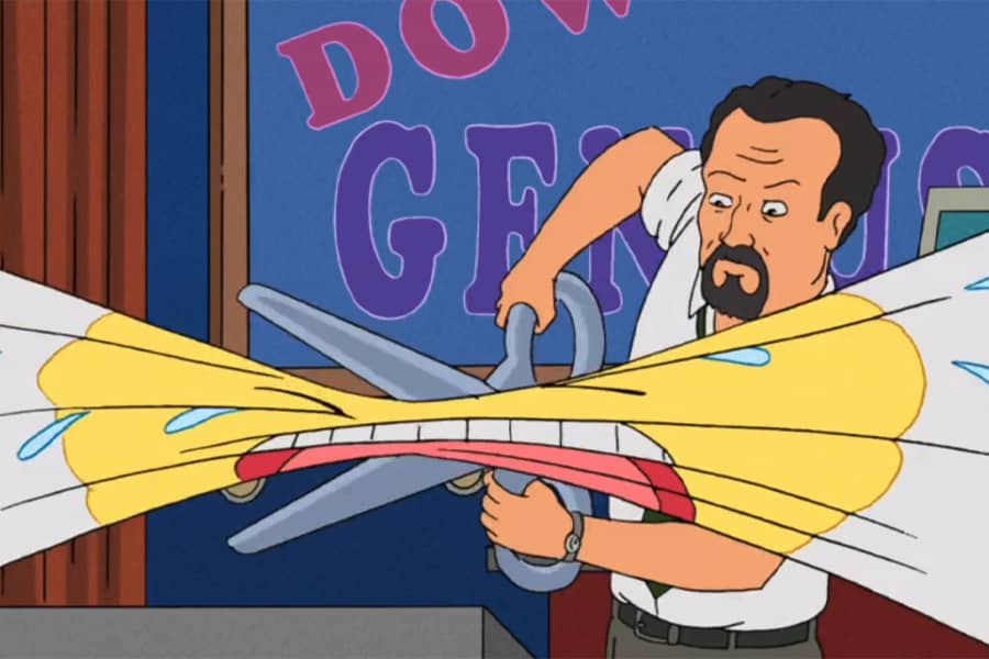 Dow Genius cutting a big banner of a crying emoji face with giant scissors