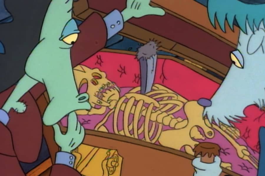 there is a skeleton in the coffin with a stake through its chest