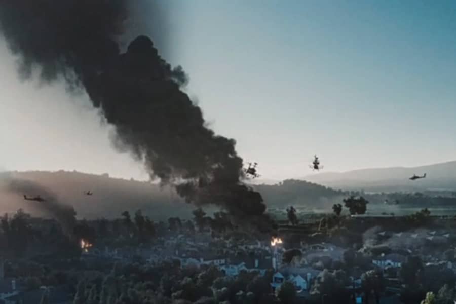 burning city with the sky full of choppers