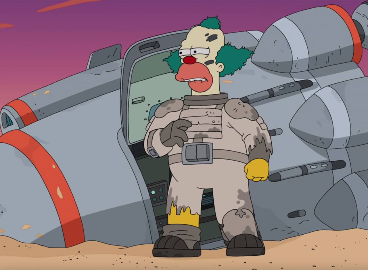 Krusty, in a beat-up space suit, emerges from a crashed ship