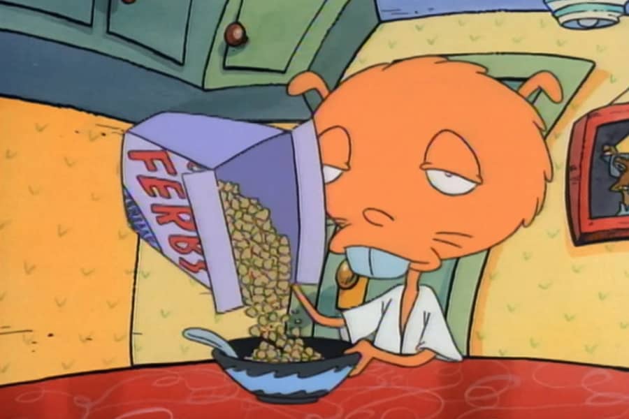 sleepy Lang-Chao filling up a bowl of cereal