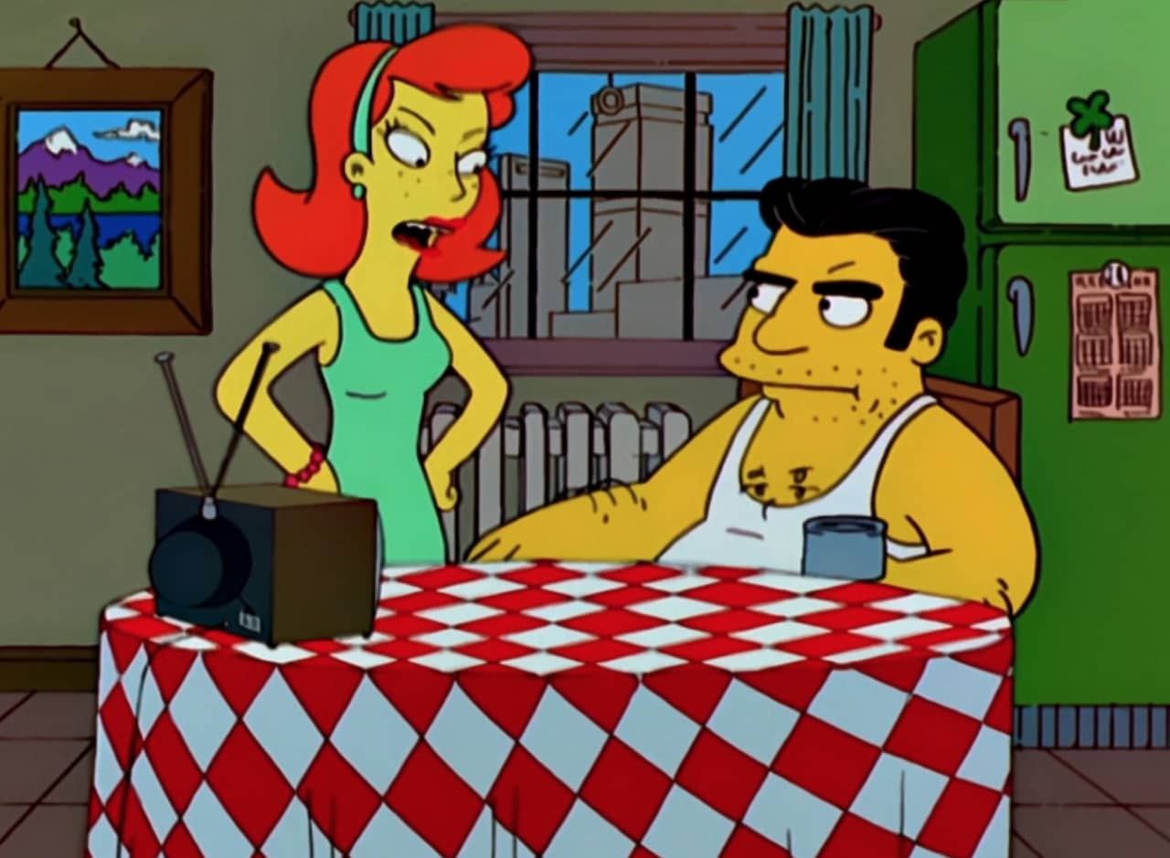 red haired English woman arguing with an Italian man sitting at a kitchen table