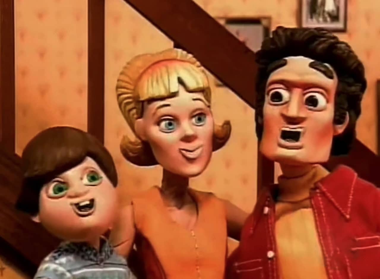 Larry with his mom and dad