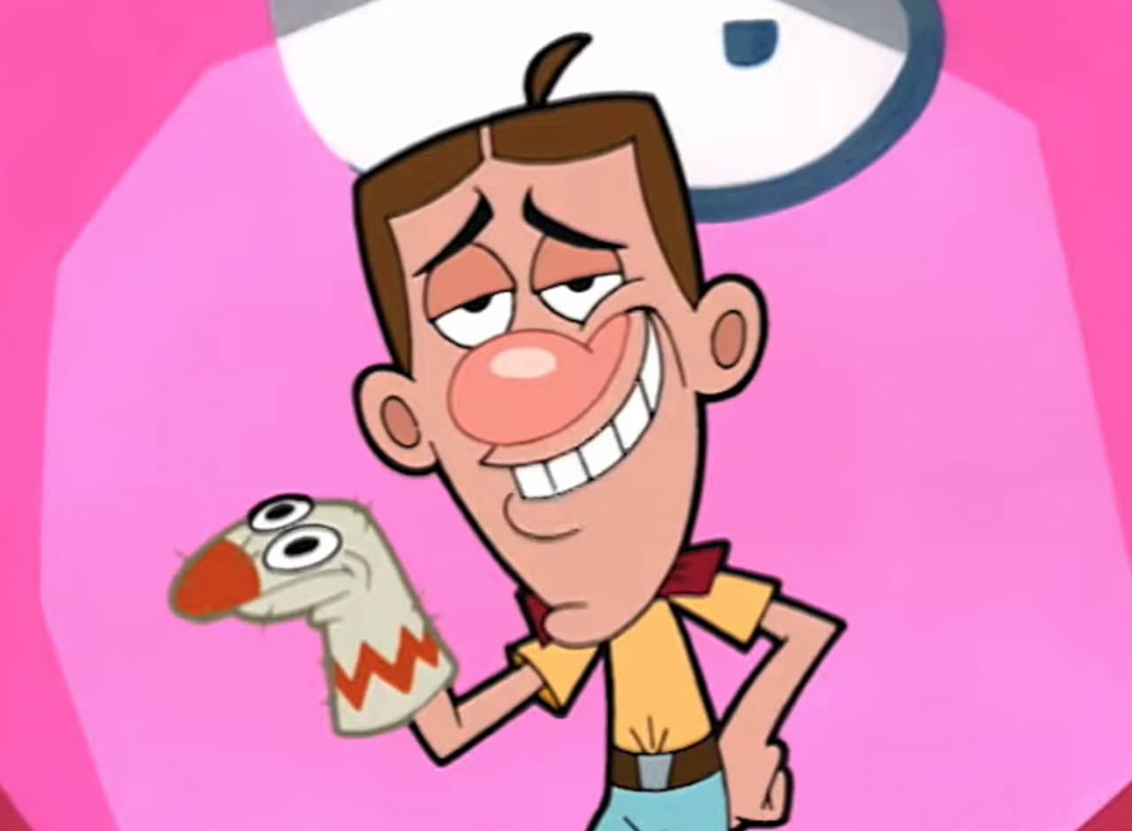 Uncle Bob, a man with a bowtie and a cowlick, a sock puppet on his hand
