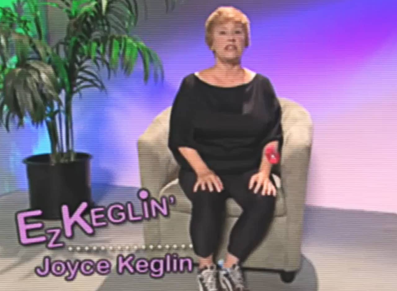 Joyce Keglin sitting in an armchair