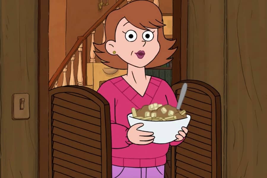 a mom with a big bowl of poutine