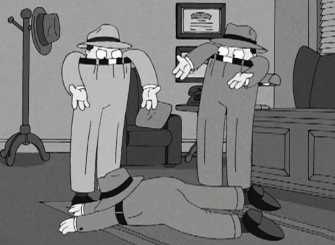 black and white still of two men in fedoras and pants up above their noses; they are discussing a dead body on the floor of an office