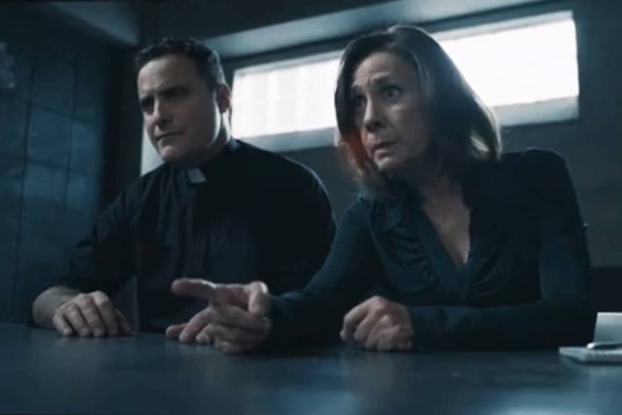 Garvey and Watts in the interrogation room