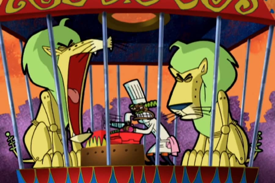 a chef cooking a meal in a cage with lions