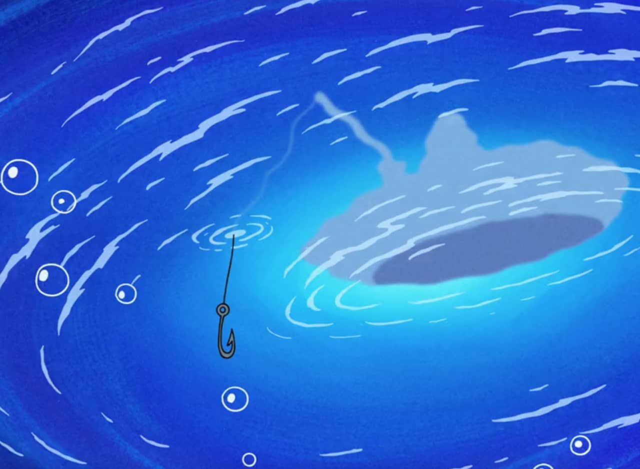 view of a boat, fishing line, and hook from below the water’s surface