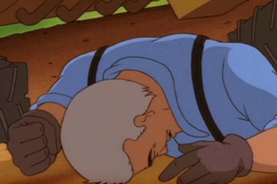 Heston angry, buries his face in the dirt