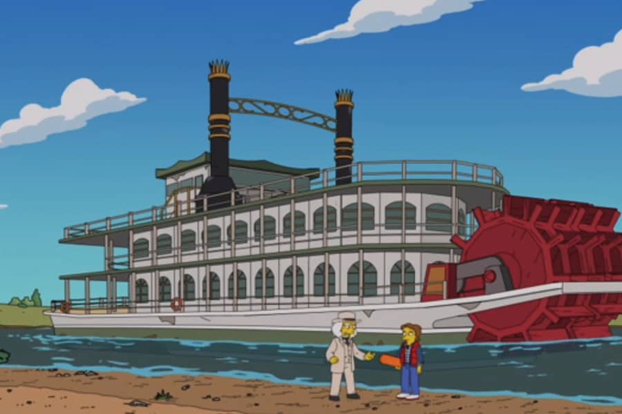 Mickey and the Professor by a paddle steamer boat