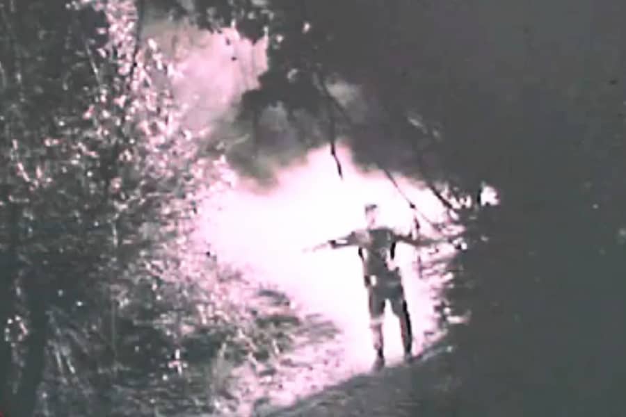 Frankenstein monster walking through the woods