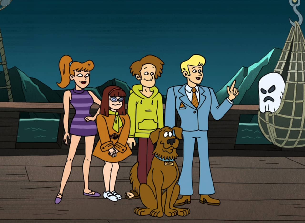 the Groovy Gang on a pirate ship with a ghost caught in a net
