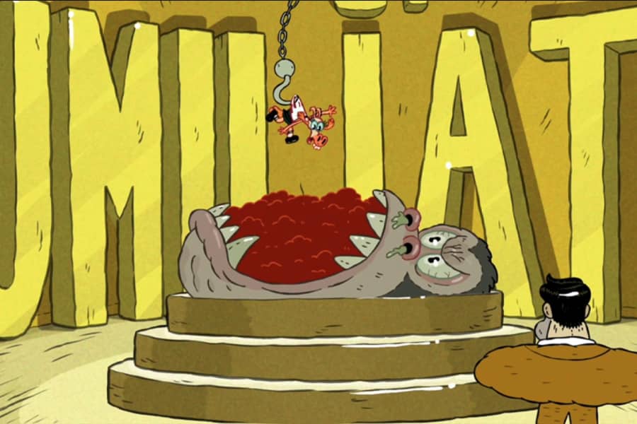 contestant hanging from a hook above a gorilla’s mouth full of sticky sauce