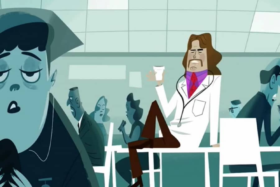 doctor casually sitting on a table in the cafeteria holding a cup of coffee