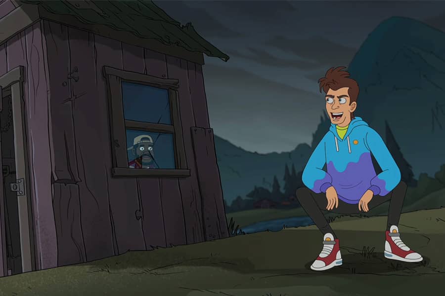 Lonny crouching outside a small hut on a golf course at night