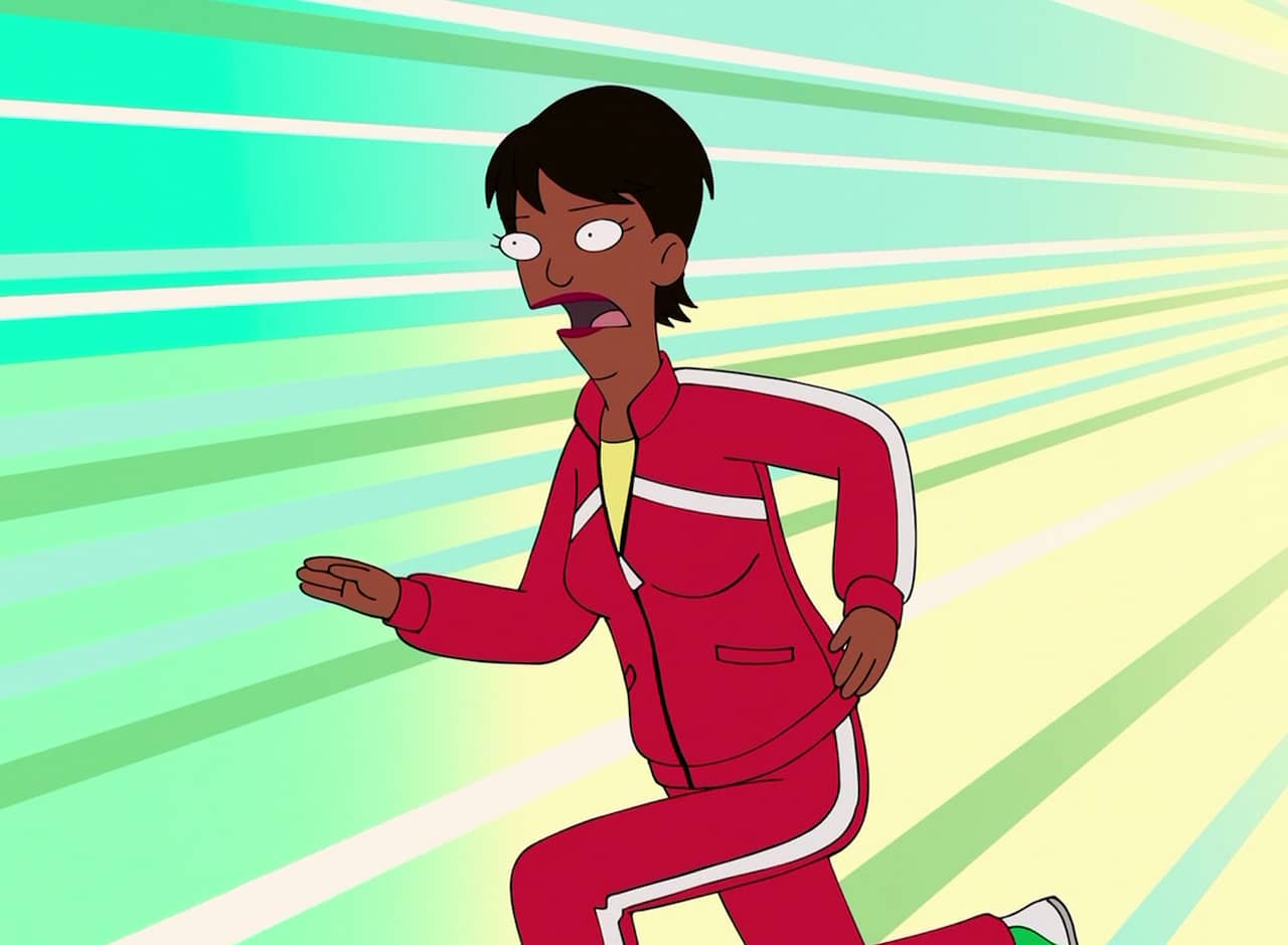 Gina Tracker, a Black woman agent wearing a red tracksuit