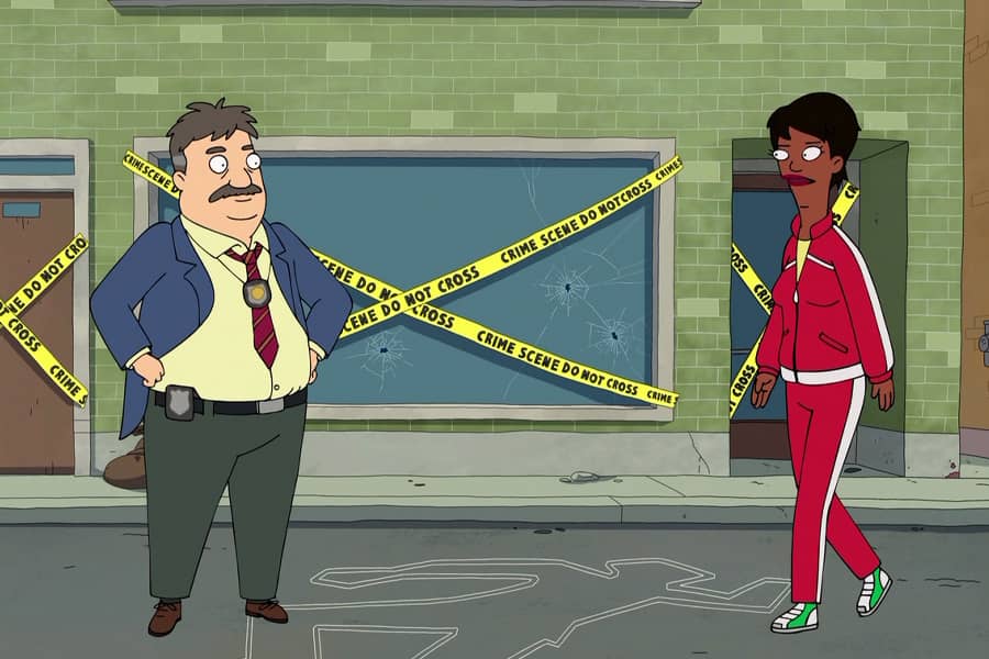Gina walks toward the mustached cop at a crime scene