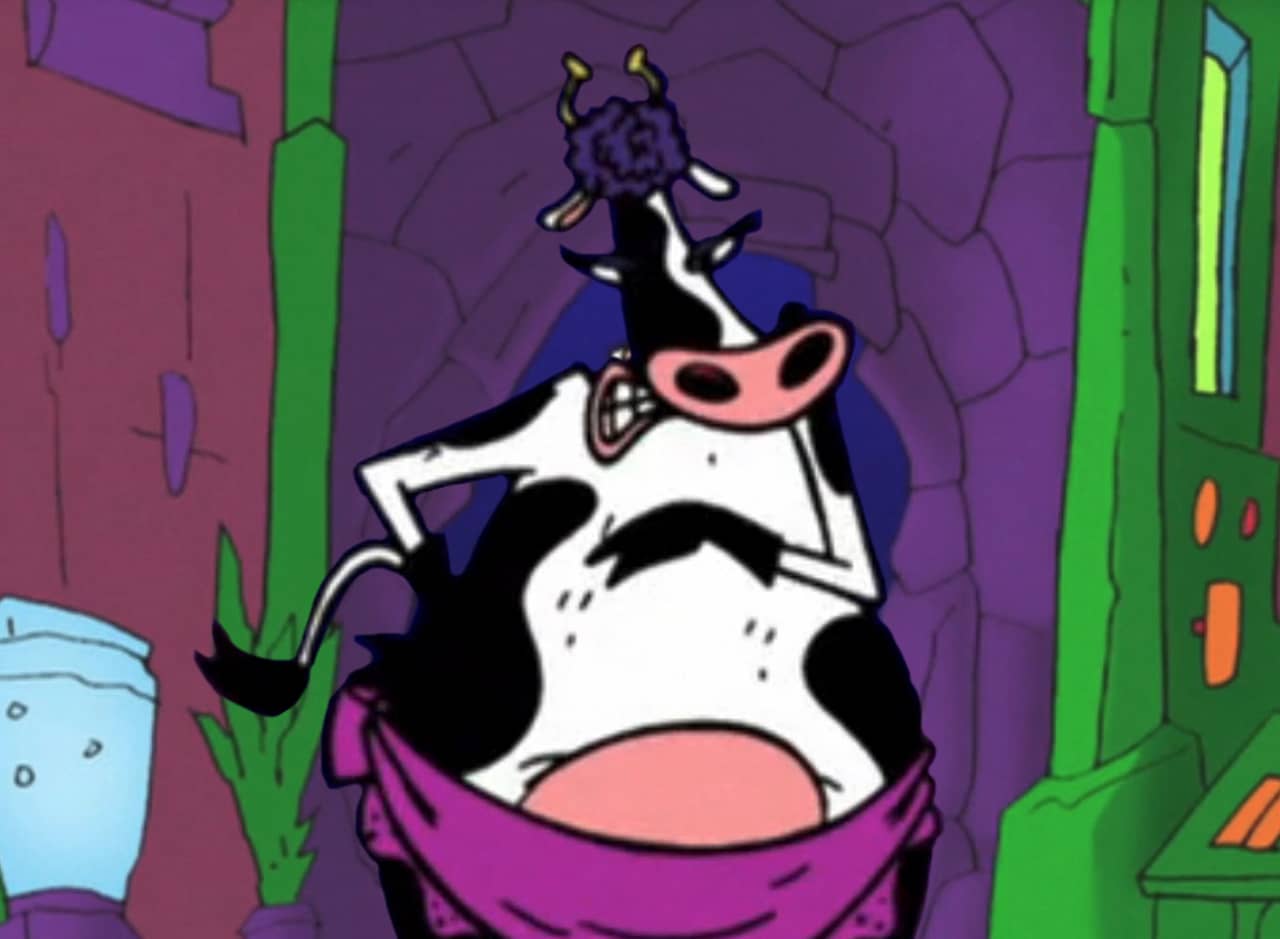 animated cow in a pink skirt