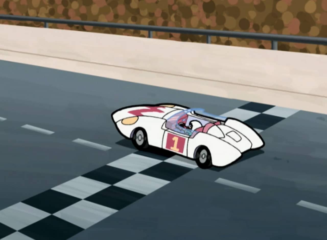 white #1 racing car crossing the checkered finish line
