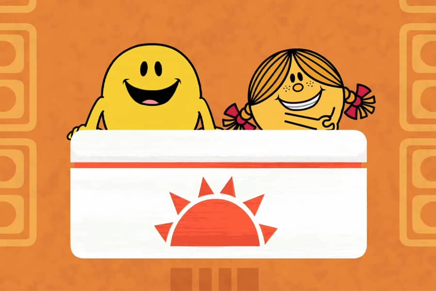 Little Miss Sunshine and Mr. Happy at a desk
