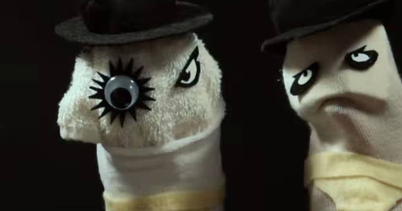 sock puppets decorated like the characters from a Clockwork Orange